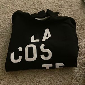 Black Lacoste sweat shirt